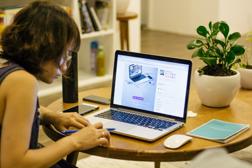 woman writing a STEM scholarship essay